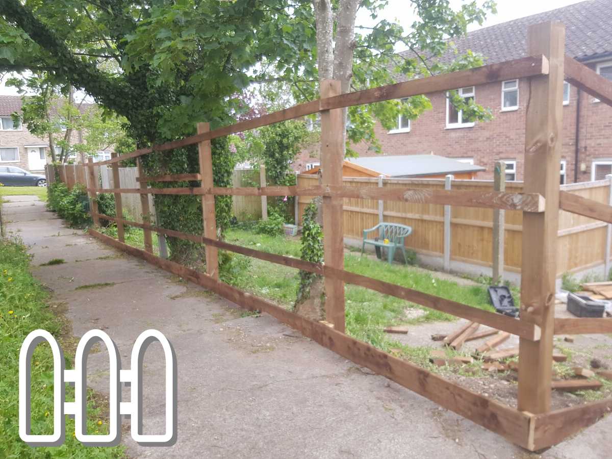 Newly constructed wooden fence along a suburban pathway, featuring a natural brown color and simple horizontal design, enhancing both privacy and aesthetics of the neighborhood.